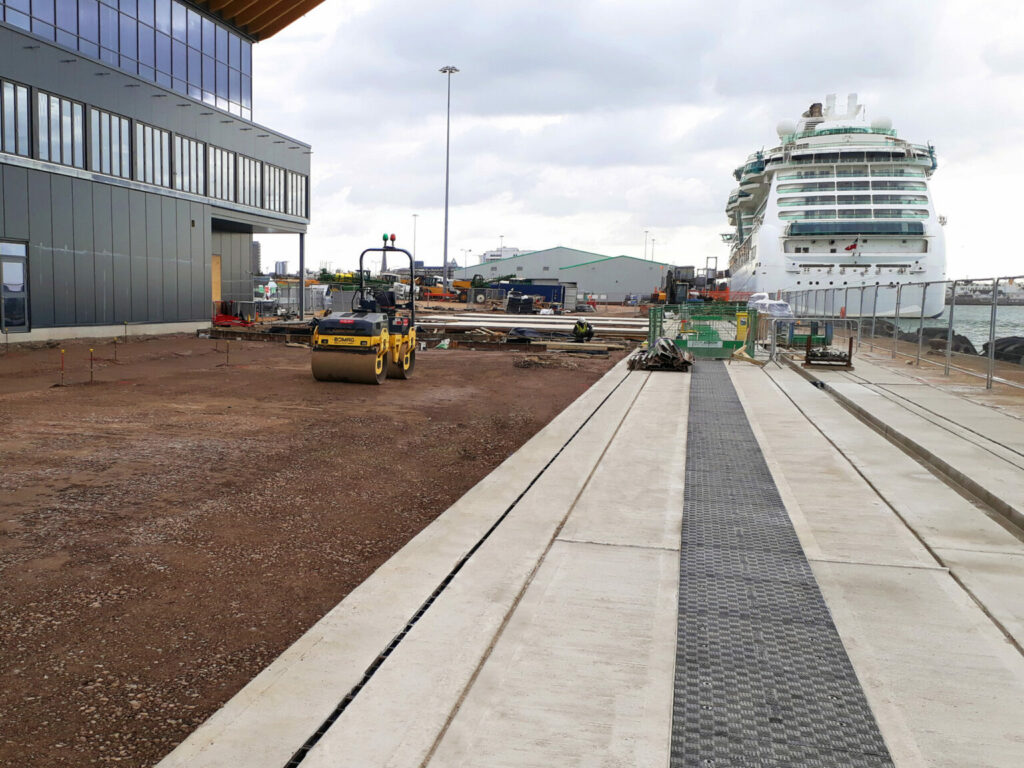 F900 (90-tonne) load rated GRP Fibrelite trench covers in precast concrete troughs:trenches at a cruise ship terminal