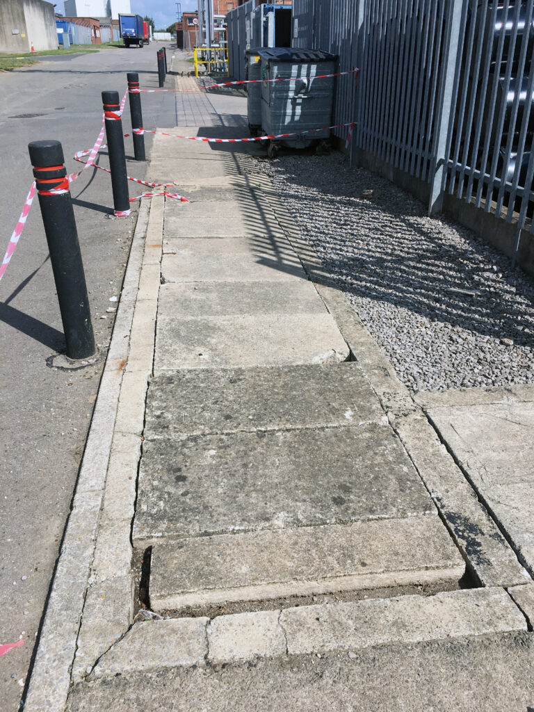 Previously installed failing concrete trench access covers