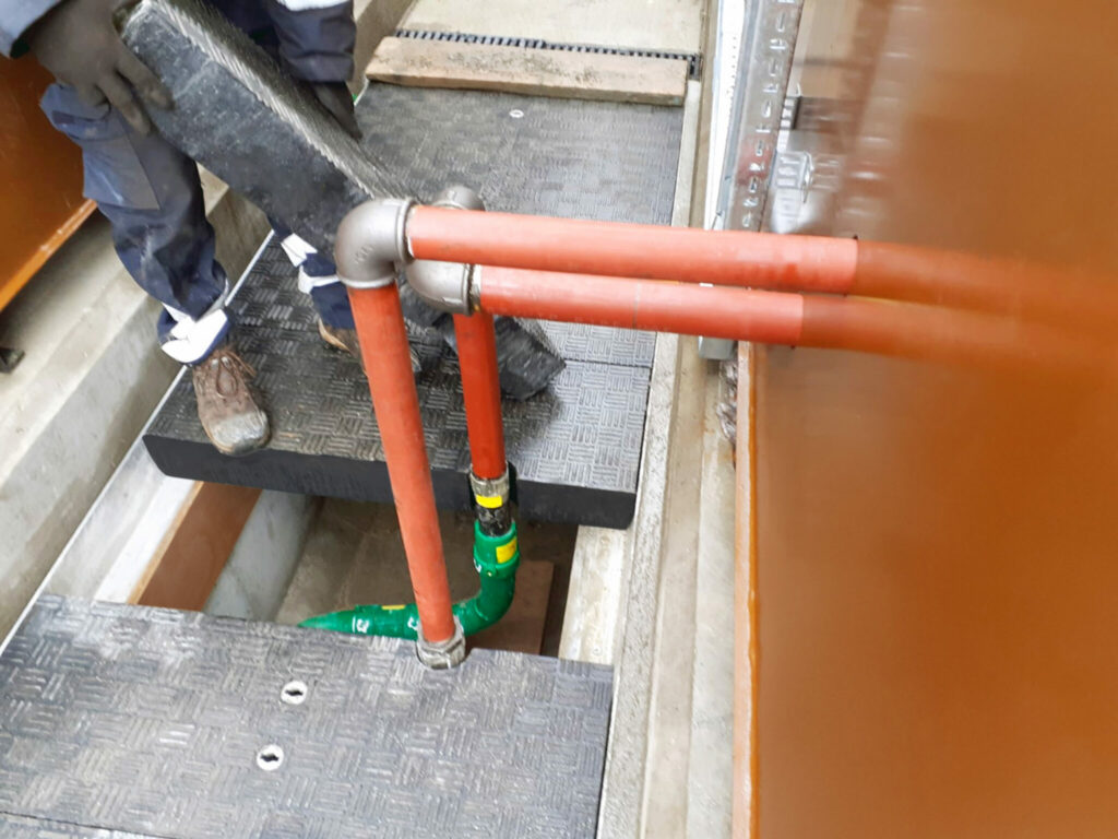 Apertures were required in some covers to accommodate pipework connecting from within the trench to above ground networks