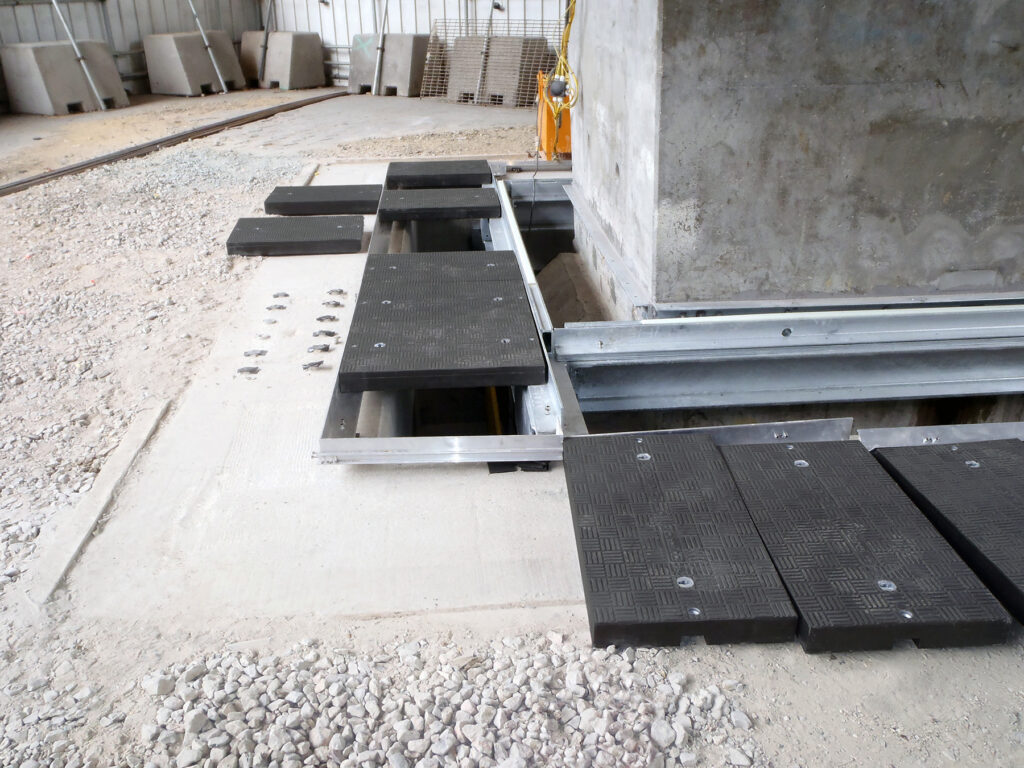 Bespoke composite trench covers designed with encapsulating frames